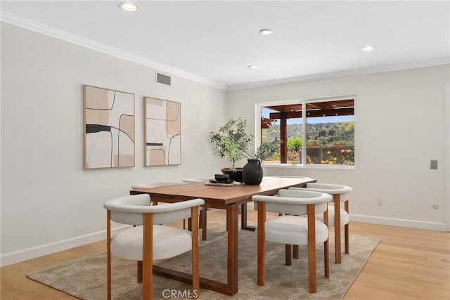 5839 Parkmor Rd, Calabasas, CA 91302 - dining space featuring light wood-type flooring, baseboards, ornamental molding, and recessed lighting