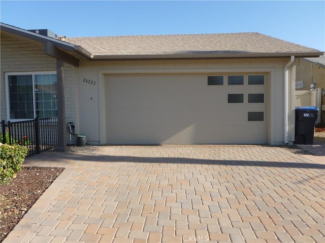 26223 Crestone Dr, Menifee, CA 92586 - garage with decorative driveway