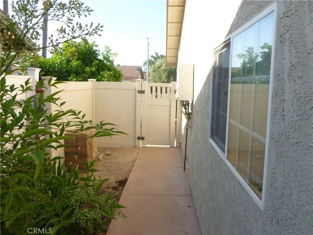 26223 Crestone Dr, Menifee, CA 92586 - view of patio featuring a gate