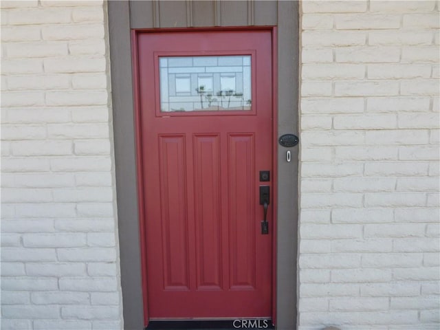 26223 Crestone Dr, Menifee, CA 92586 - doorway to property with brick siding