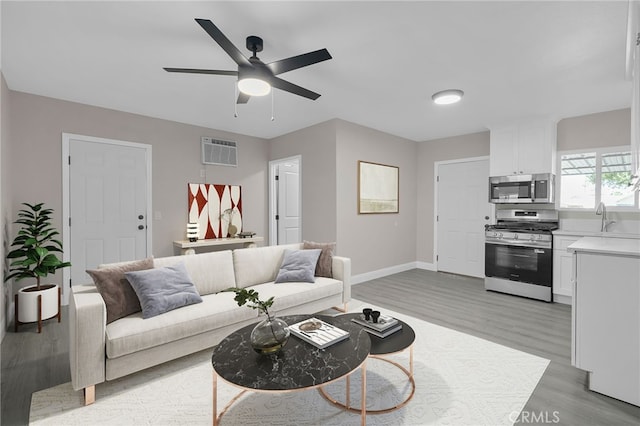 4875 Fairway Blvd, Chino Hills, CA 91709 - living area featuring light wood-type flooring, baseboards, and ceiling fan