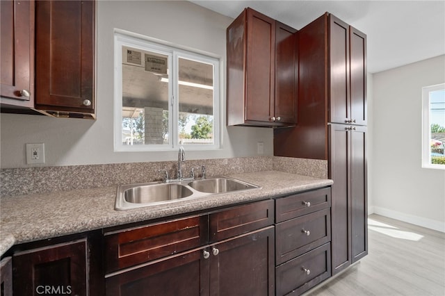 4875 Fairway Blvd, Chino Hills, CA 91709 - kitchen with a sink, healthy amount of natural light, light wood finished floors, and light countertops