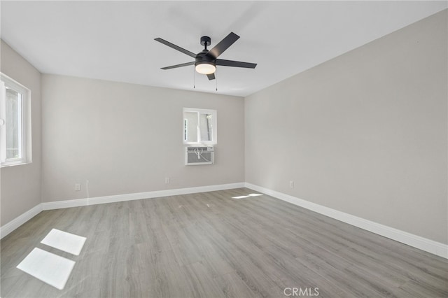 4875 Fairway Blvd, Chino Hills, CA 91709 - unfurnished room featuring plenty of natural light, light wood-style floors, a ceiling fan, and baseboards