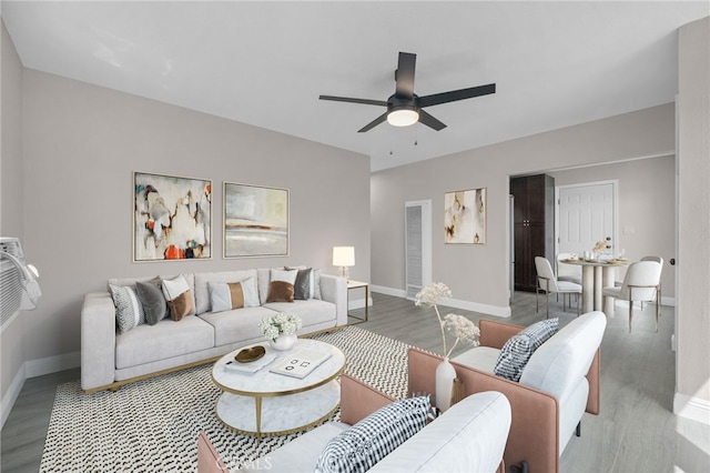 4875 Fairway Blvd, Chino Hills, CA 91709 - living room featuring ceiling fan, baseboards, and wood finished floors