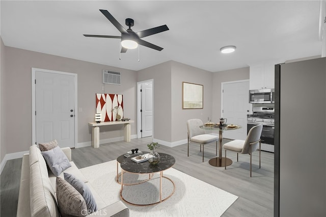 4875 Fairway Blvd, Chino Hills, CA 91709 - living area featuring light wood-style floors, a ceiling fan, and baseboards