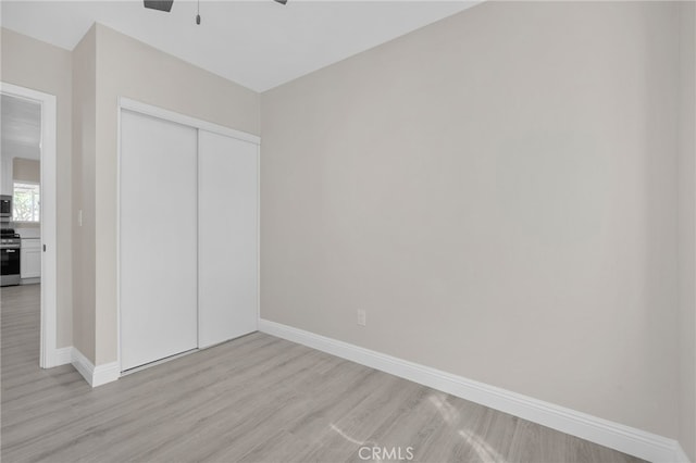 4875 Fairway Blvd, Chino Hills, CA 91709 - unfurnished bedroom featuring light wood finished floors, baseboards, a closet, and a ceiling fan