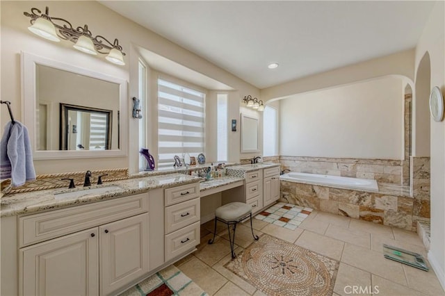 2101 S Sanders Ct, La Habra, CA 90631 - bathroom featuring a garden tub, vanity, and tile patterned flooring