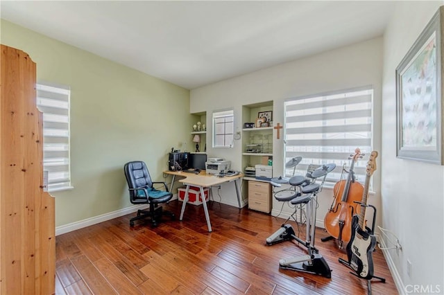 2101 S Sanders Ct, La Habra, CA 90631 - home office featuring wood finished floors and baseboards