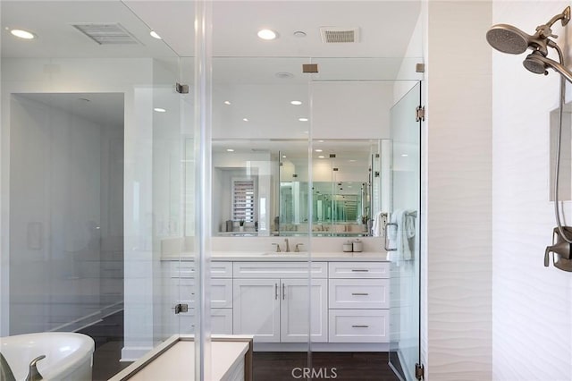 135 Via Artemesia, San Clemente, CA 92672 - bathroom with vanity, a stall shower, and recessed lighting