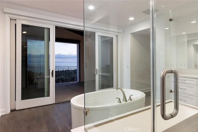 135 Via Artemesia, San Clemente, CA 92672 - full bath with a soaking tub, wood-type flooring, recessed lighting, and an enclosed shower