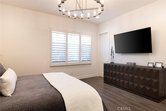 135 Via Artemesia, San Clemente, CA 92672 - bedroom featuring a chandelier, dark wood-style flooring, and baseboards