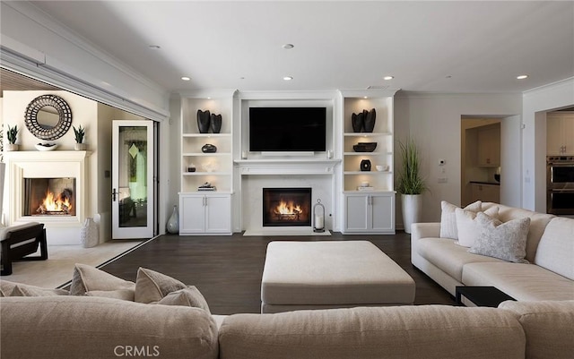 135 Via Artemesia, San Clemente, CA 92672 - living area with a lit fireplace, ornamental molding, recessed lighting, and dark wood-type flooring