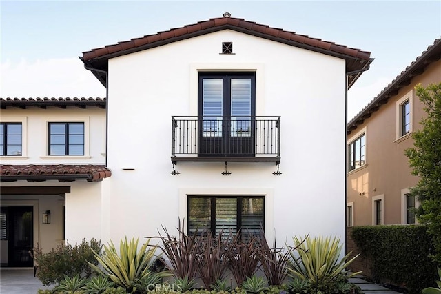 135 Via Artemesia, San Clemente, CA 92672 - view of side of property featuring a balcony, a tile roof, and stucco siding