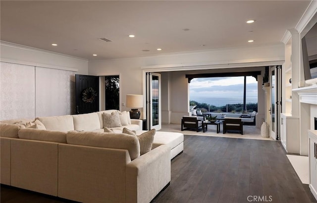 135 Via Artemesia, San Clemente, CA 92672 - living room with crown molding, dark wood finished floors, a premium fireplace, and recessed lighting