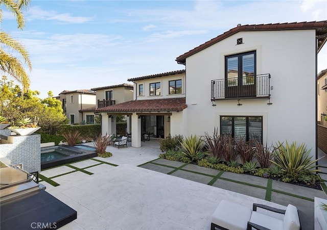 135 Via Artemesia, San Clemente, CA 92672 - rear view of property with a tiled roof, a patio, a balcony, stucco siding, and a pool with connected hot tub