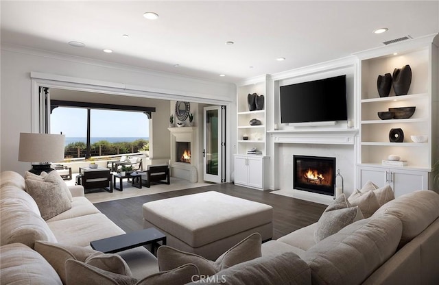 135 Via Artemesia, San Clemente, CA 92672 - living area with a high end fireplace, wood finished floors, ornamental molding, and recessed lighting