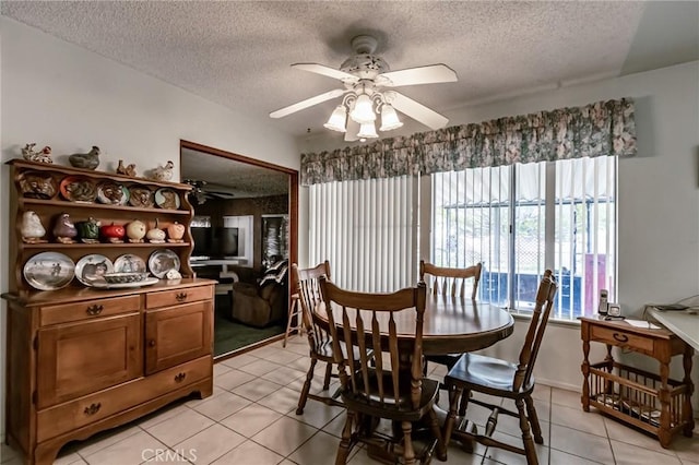 26218 Mccall Blvd, Menifee, CA 92586 - dining room with a textured ceiling, light tile patterned flooring, and a ceiling fan