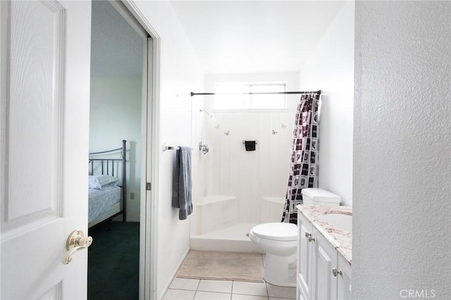 26218 Mccall Blvd, Menifee, CA 92586 - full bathroom featuring a stall shower, toilet, vanity, tile patterned flooring, and connected bathroom