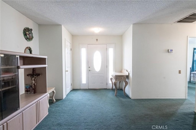 26218 Mccall Blvd, Menifee, CA 92586 - carpeted entryway with a textured ceiling