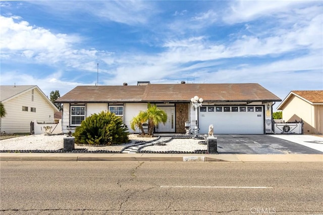26218 Mccall Blvd, Menifee, CA 92586 - ranch-style home with concrete driveway, a garage, a gate, and fence