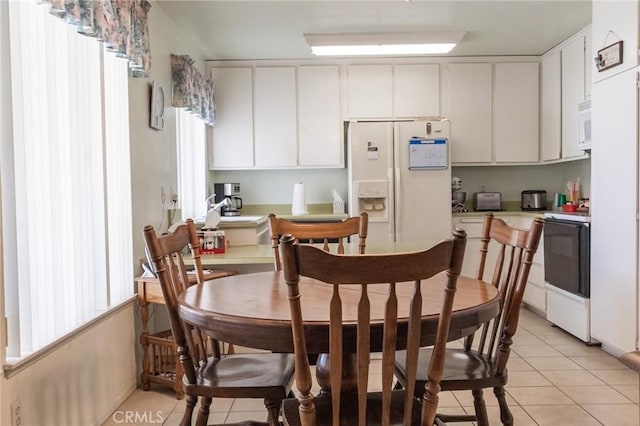 26218 Mccall Blvd, Menifee, CA 92586 - dining room featuring light tile patterned flooring