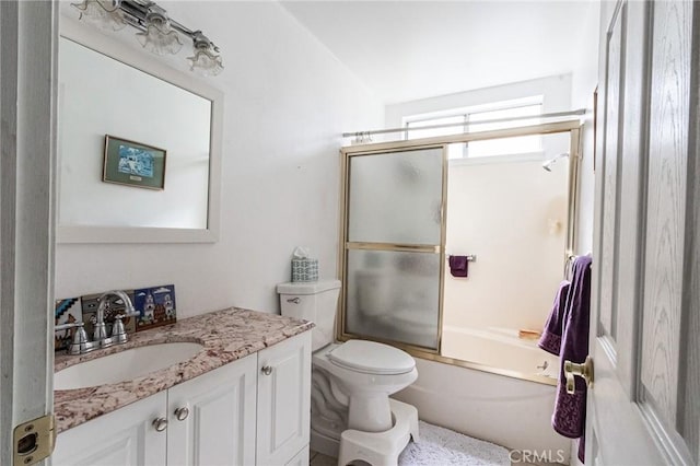 26218 Mccall Blvd, Menifee, CA 92586 - bathroom featuring vanity, bath / shower combo with glass door, and toilet