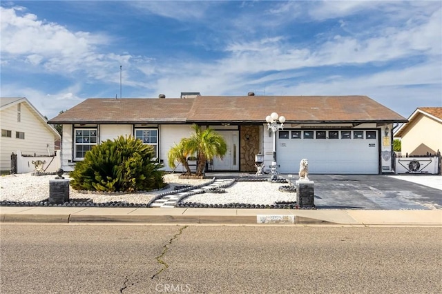 26218 Mccall Blvd, Menifee, CA 92586 - single story home featuring driveway, an attached garage, and fence