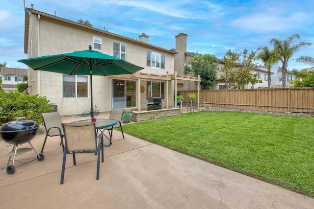 11590 Trailbrook Ln, San Diego, CA 92128 - back of property with stucco siding, a patio area, and a chimney
