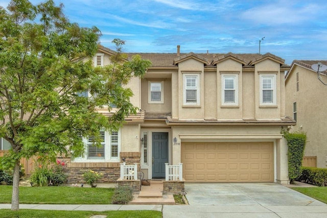11590 Trailbrook Ln, San Diego, CA 92128 - view of property with a garage, concrete driveway, stucco siding, stone siding, and a tiled roof