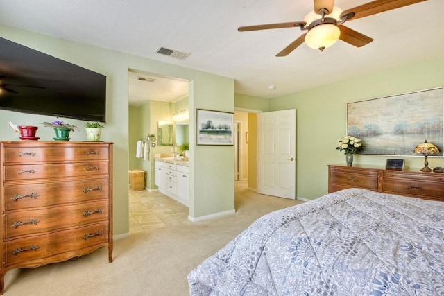 11590 Trailbrook Ln, San Diego, CA 92128 - bedroom featuring light colored carpet, baseboards, a ceiling fan, and ensuite bath