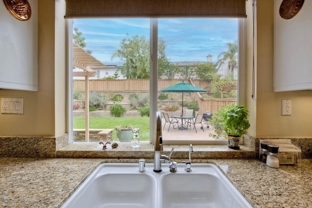 11590 Trailbrook Ln, San Diego, CA 92128 - kitchen view of light stone countertops and a sink