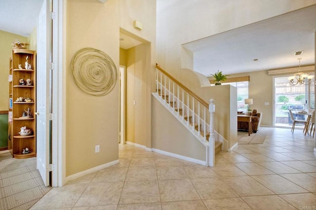 11590 Trailbrook Ln, San Diego, CA 92128 - tiled entrance foyer featuring stairs, a chandelier, and baseboards