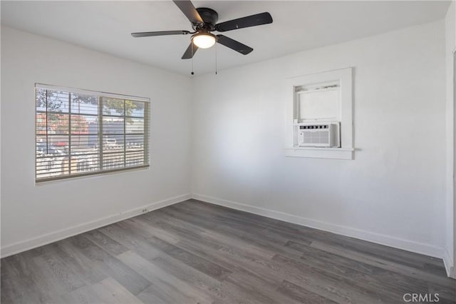 1550 E Sandison St, Wilmington, CA 90744 - unfurnished room with dark wood-type flooring, cooling unit, a ceiling fan, and baseboards
