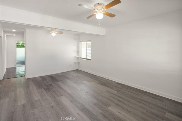 1550 E Sandison St, Wilmington, CA 90744 - empty room with a ceiling fan, wood finished floors, and baseboards