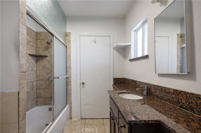 1550 E Sandison St, Wilmington, CA 90744 - bathroom with vanity, tile patterned flooring, and bath / shower combo with glass door