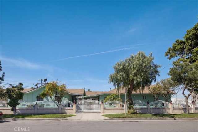1550 E Sandison St, Wilmington, CA 90744 - view of property hidden behind natural elements featuring a fenced front yard