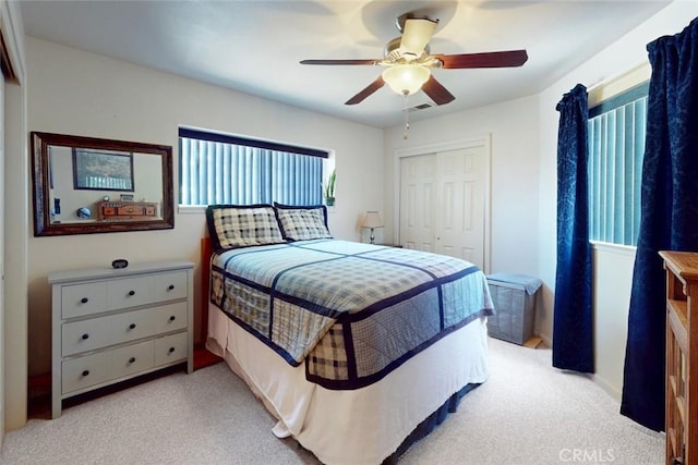1401 Norton St, Oroville, CA 95966 - bedroom featuring light carpet, a closet, and a ceiling fan