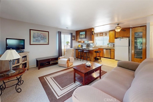 1401 Norton St, Oroville, CA 95966 - living room with light carpet and ceiling fan
