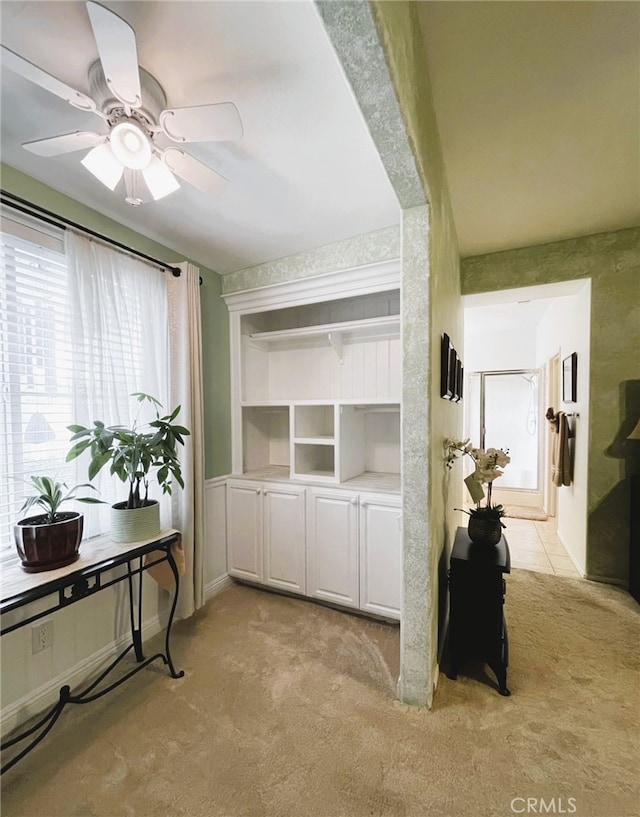13217 Acacia Ave, Moreno Valley, CA 92553 - sitting room with light carpet and ceiling fan