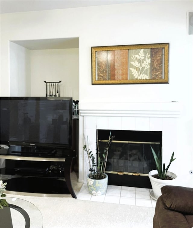 13217 Acacia Ave, Moreno Valley, CA 92553 - tiled living area with a fireplace