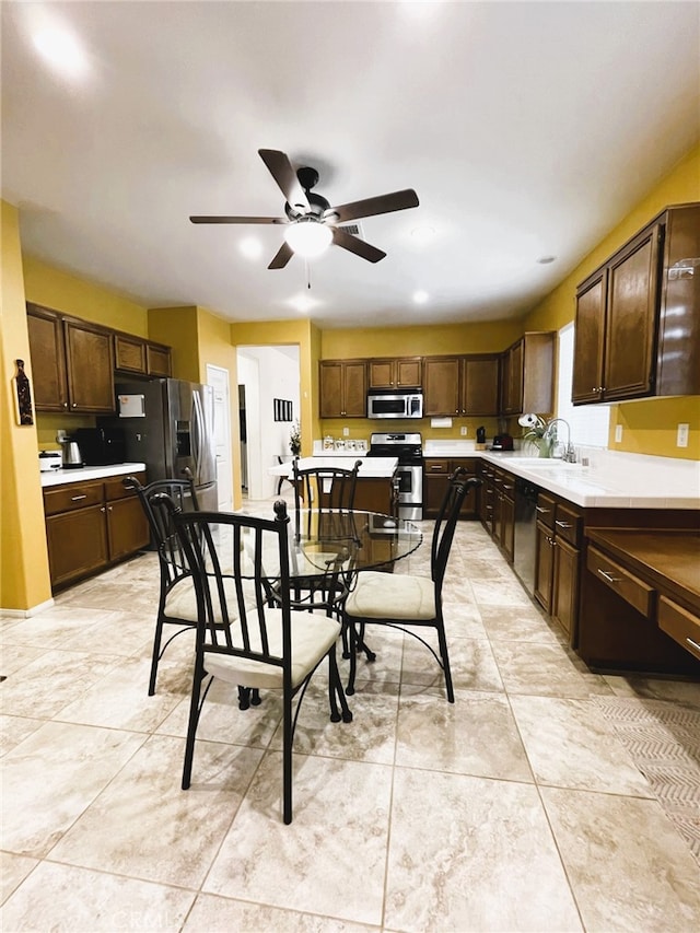 13217 Acacia Ave, Moreno Valley, CA 92553 - dining room featuring a ceiling fan and recessed lighting