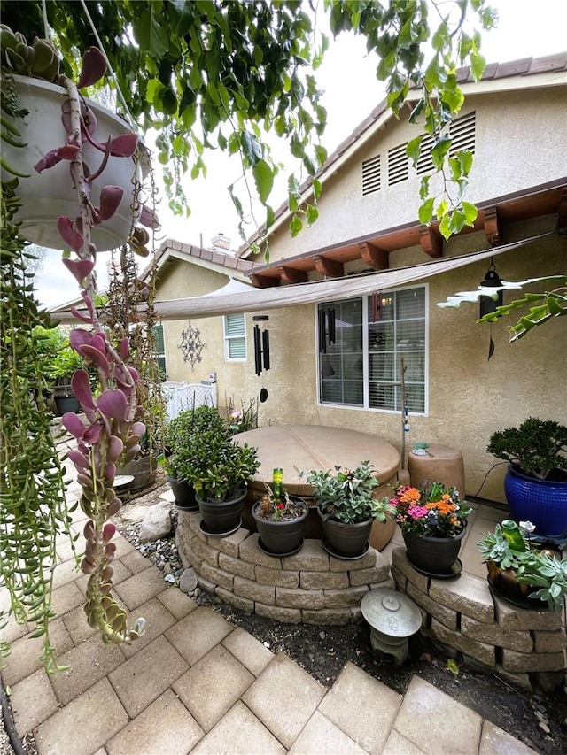 13217 Acacia Ave, Moreno Valley, CA 92553 - rear view of property featuring a patio and stucco siding