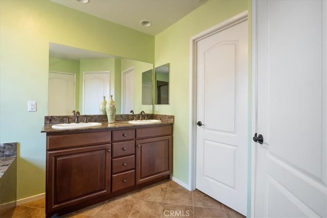 287 Tom Mcguinness Jr Cir, Fallbrook, CA 92028 - full bathroom with double vanity, tile patterned floors, and baseboards