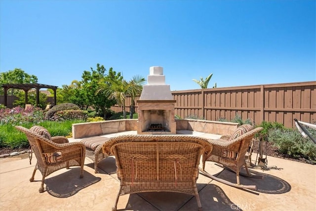 287 Tom Mcguinness Jr Cir, Fallbrook, CA 92028 - view of patio / terrace with an outdoor living space with a fireplace and a pergola