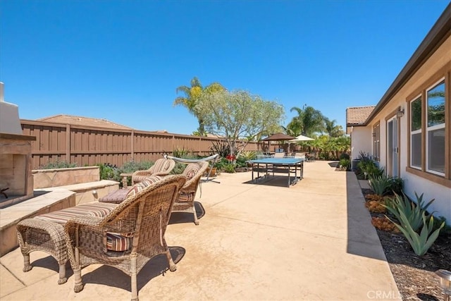 287 Tom Mcguinness Jr Cir, Fallbrook, CA 92028 - fenced backyard with outdoor dining area, a patio area, and an outdoor living space