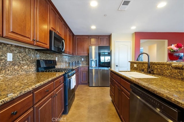287 Tom Mcguinness Jr Cir, Fallbrook, CA 92028 - kitchen featuring black gas range oven, stainless steel refrigerator with ice dispenser, a sink, dishwashing machine, and stone countertops