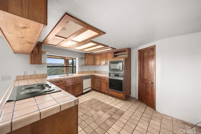 879 Stewart Canyon Rd, Fallbrook, CA 92028 - kitchen featuring tile counters, black appliances, open shelves, a sink, and brown cabinetry