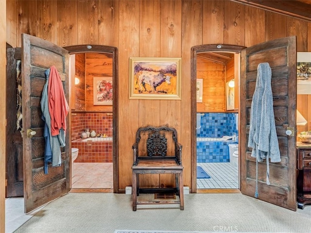 6570 Moonstone Beach Dr, Cambria, CA 93428 - hall featuring wooden walls and carpet