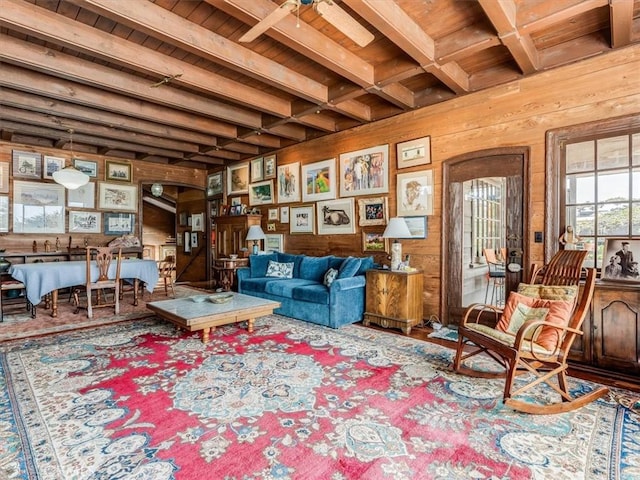 6570 Moonstone Beach Dr, Cambria, CA 93428 - living area featuring wooden walls, wood ceiling, and beamed ceiling