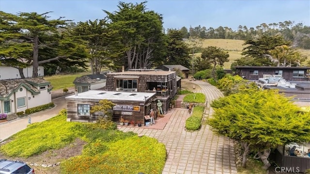 6570 Moonstone Beach Dr, Cambria, CA 93428 - drone / aerial view of a tree filled landscape